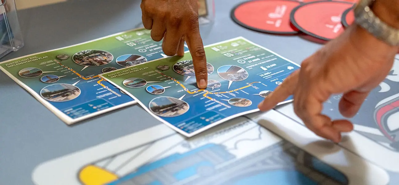 Members reviewing light rail map